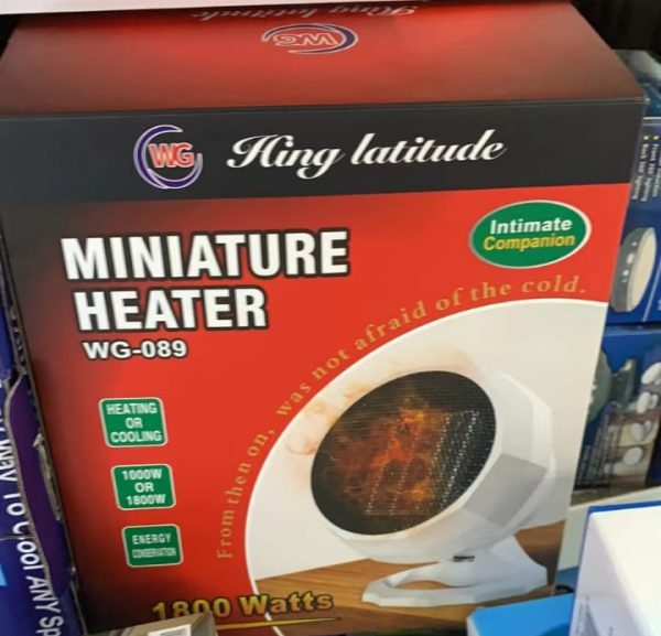 Miniature heater model WG-089..  Flexible 1800W Portable Electric Heater Fan Winter Warm Hot Fan Home Office Winter Warmer(random color )