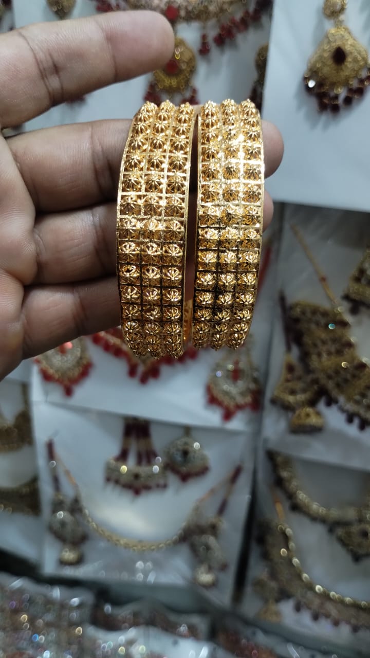 Golden Brass Bangles for Women â€“ 1 Pair Artificial Jewelry Bangles in Bright Gold Color for Daily Use, Festive Wear, and Party Styling